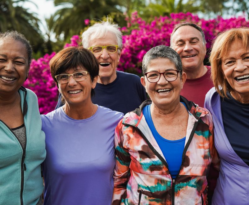 a group of older adults getting ready to go for a run together